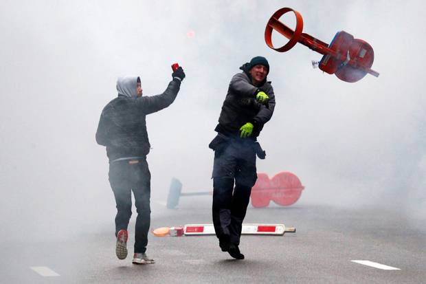 Violent clash outside EU HQ in protest over migrant pact